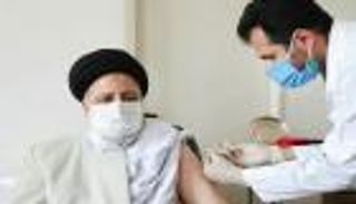 بعد أن أحرجهم نجاد باللقاح الأمريكي.. رئيس إيران يتستر بـ"بركة"