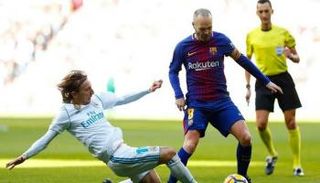 مودريتش وإنييستا