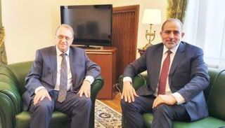 بوغدانوف خلال استقبال النايض في موسكو 