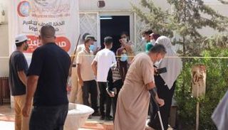 مواطنون بأحد مراكز لقاح كورونا في ليبيا (أرشيفية)