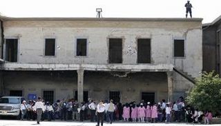 ماكرون تحت حراسة خاصة خلال زيارته للموصل - الفرنسية