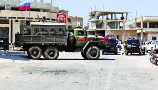 الشرطة العسكرية الروسية تنتشر في أحياء درعا - أ.ف.ب