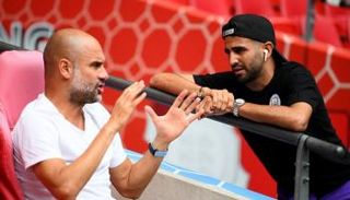 رياض محرز وبيب جوارديولا 