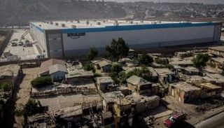 مخزن أمازون بمدينة تيخوانا المكسيكية الفقيرة - رويترز