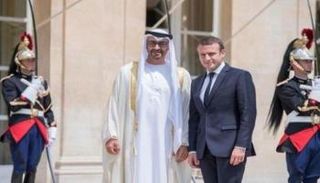 الشيخ محمد بن زايد آل نهيان خلال لقاء سابق مع إيمانويل ماكرون