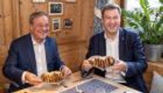 "لقاء النقانق".. هل ينقذ "اتحاد ميركل" قبل الانتخابات؟