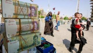 انهيار الريال الإيراني أمام الدولار