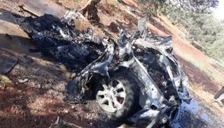 سيارة دمرتها غارة للتحالف