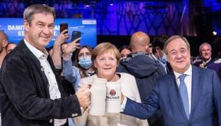 ميركل ولاشيت في لقاء أمس