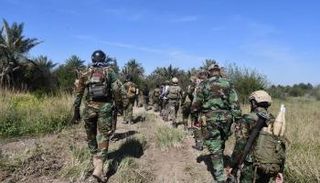 قوة أمنية خلال عمليات ملاحقة داعش في العراق