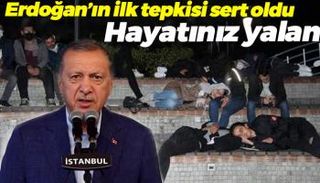 أردوغان ومن خلفه الطلاب يفترشون الحدائق