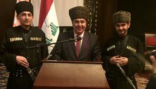 المشرح الشركسي في الانتخابات العراقية أحمد كتاو بلباس فلكوري