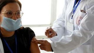 اللقاح يقود معركة العلم ضد فيروس كورونا- أرشيفية