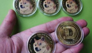 دوجكوين أكثر العملات الرقمية صعودا اليوم 