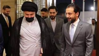 الحلبوسي والصدر خلال لقاء جمعهما في النجف