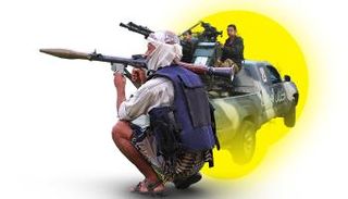 عناصر حوثية تحمل الأسلحة- أرشيفية