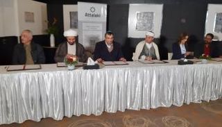 جانب من توقيع الميثاق الوطني المشترك للتعايش السلمي