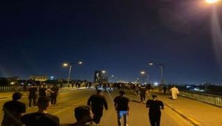 جانب من انسحاب المتظاهرين في ذكرى انتفاضة تشرين