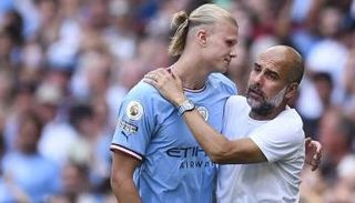 جوارديولا مع هالاند في مانشستر سيتي