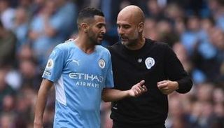 رياض محرز نجم مانشستر سيتي ومدربه جوارديولا