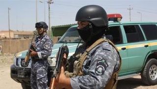 عناصر من شرطة الديوانية جنوب العراق- أرشيفية
