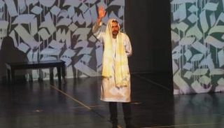 مشهد من مسرحية ملاسين ستوري