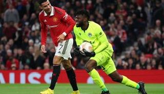 فرانسيس أوزوهو يبتسم مع كريستيانو رونالدو