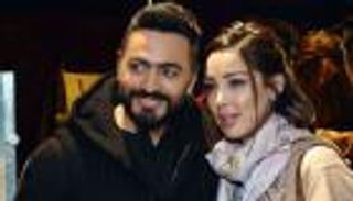 بحضور سبايدر مان.. تامر حسني وبسمة بوسيل يحتفلان بـ"آدم" (فيديو)