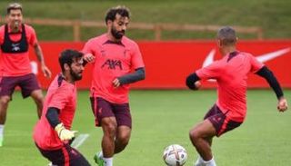 محمد صلاح وأليسون بيكر