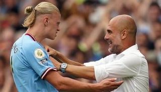 إيرلينج هالاند وبيب جوارديولا 