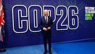 الرئيس الأمريكي جو بايدن في COP26 - رويترز