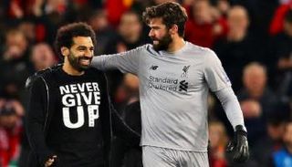 محمد صلاح وأليسون بيكر