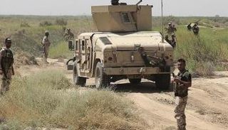 قوة من الجيش العراقي عند منطقة الطارمية