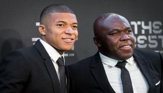 كيليان مبابي مع والده