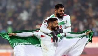 احتفال لاعبي المنتخب الإيراني بالفوز على ويلز