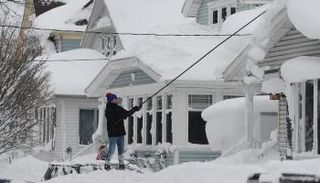 الثلوج دفنت المنازل