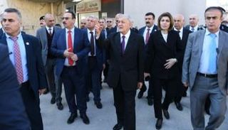 الرئيس العراقي خلال جولته بالموصل