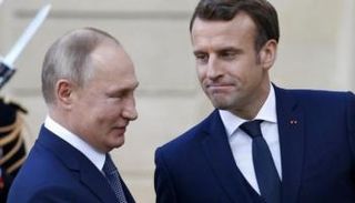 الرئيسان الفرنسي والروسي خلال لقاء سابق