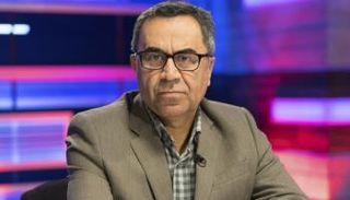 الناشط والصحفي الإيراني رضا علي خاني