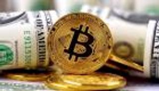 بيتكوين تقفز والذهب يتراجع والدولار ينتعش في أول أيام الحرب الروسية