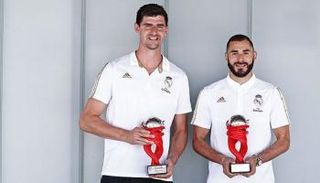 كريم بنزيما وتيبو كورتوا نجما ريال مدريد