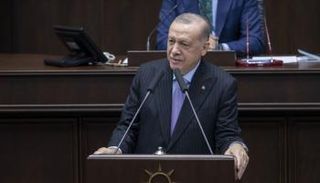 الرئيس التركي خلال مشاركته بالاجتماع