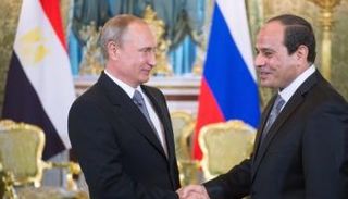 السيسي وبوتين في لقاء سابق