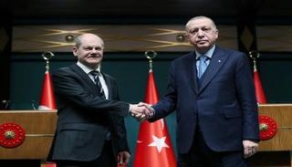 المستشار الألماني والرئيس التركي خلال لقاء اليوم