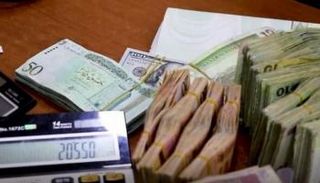 أحد الصرافات في ليبيا- أرشيفية