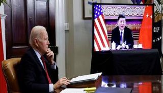 بايدن وشي جين بينغ خلال أخر قمة افتراضية بينهما