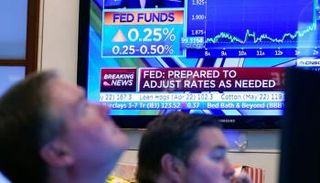 ارتفاع الأسواق العالمية بعد رفع الفائدة الأمريكية