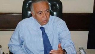 رئيس بنك التعمير والإسكان السابق محمد فتحي السباعي منصور