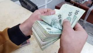 أحد الصرافات في ليبيا - أرشيفية 