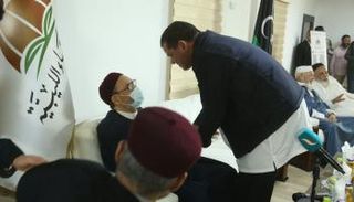 جانب من لقاء الدبيبة والغرياني على هامش حفل إعلان رؤية هلال شهر رمضان